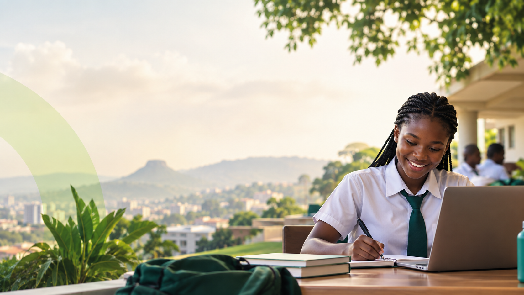 A confident African secondary school student studying outdoors with a laptop and notebook