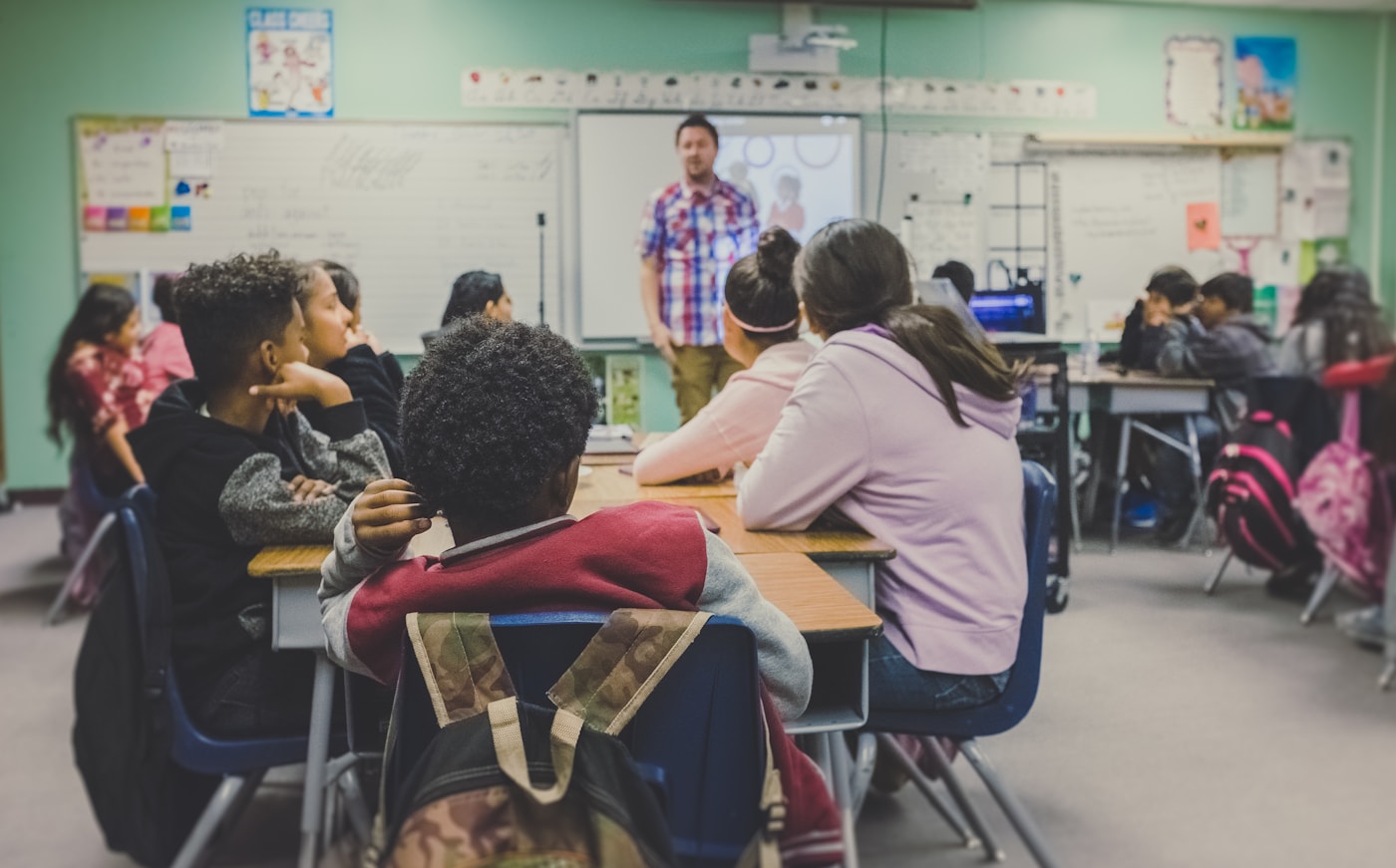 African students actively learning in a bright classroom